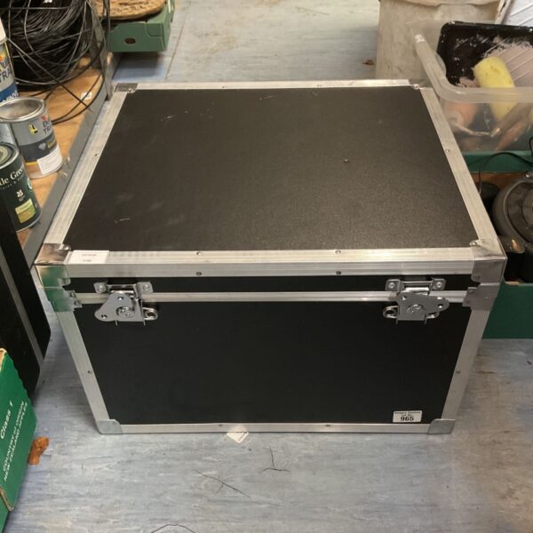 Large silver and black flight case with aluminium edging and metal latches