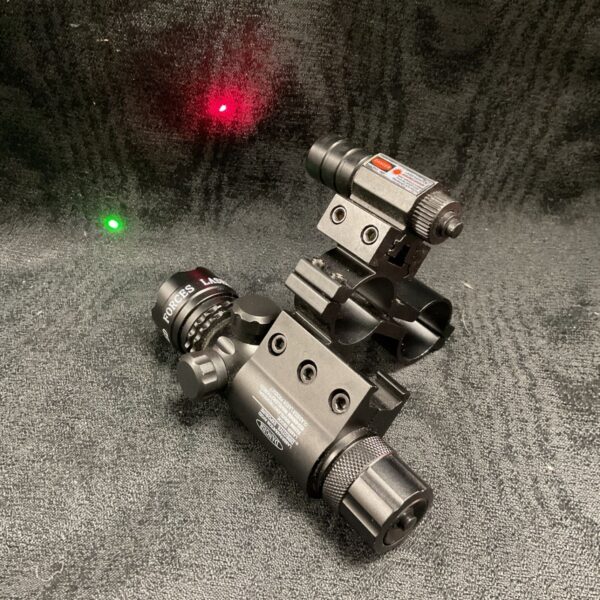 Black laser rifle sight displaying red and green laser dots.