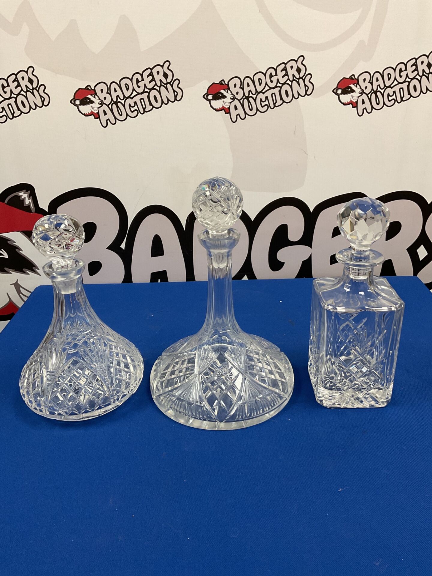 071 Three lead crystal whiskey & ships decanters