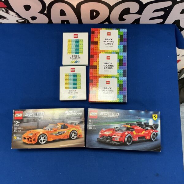 Lego bundle featuring Ferrari model, Fast and Furious set, and playing cards.