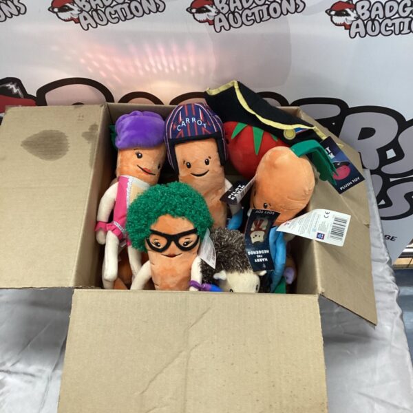 Box of Lidl plush toys including carrot characters and a hedgehog