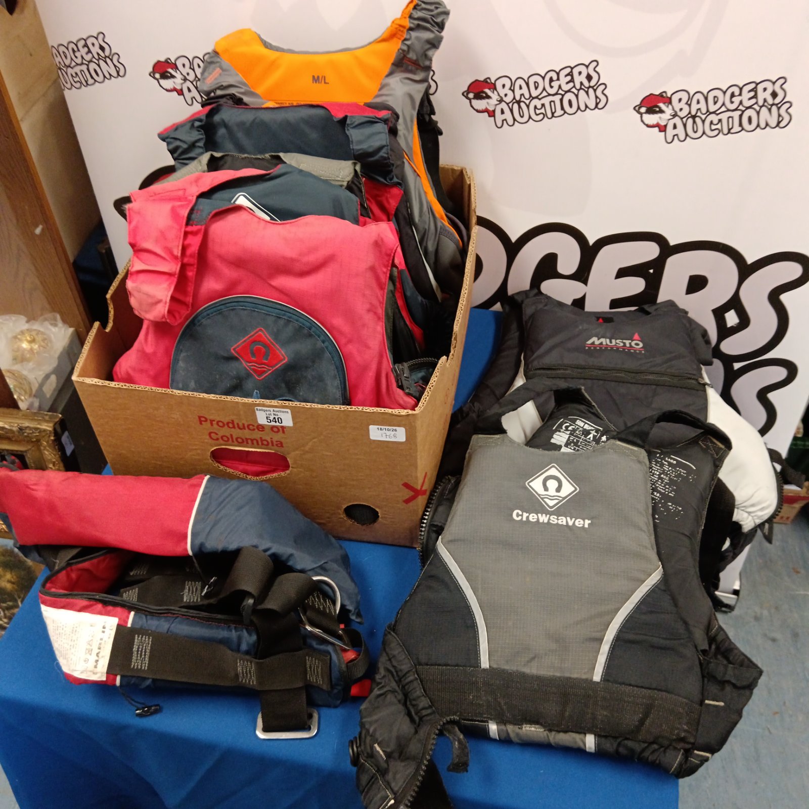 Assorted life jackets including Musto and Crewsaver brands.