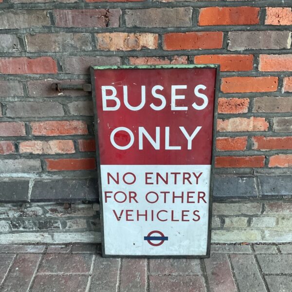 Vintage London bus enamel sign with iron frame.