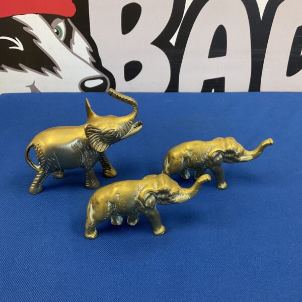 Three solid brass elephant figurines