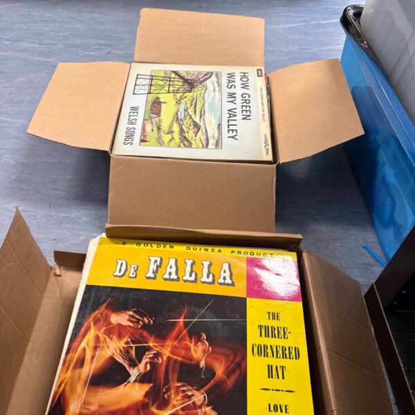 Two boxes full of mixed 12’ vinyl records