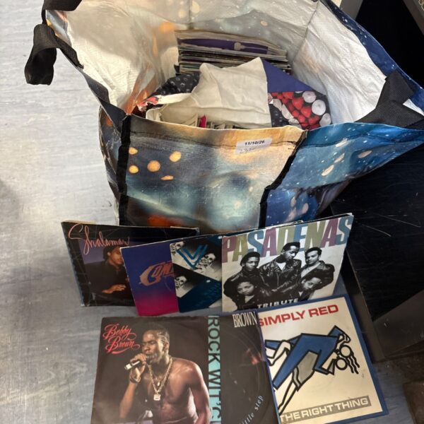 Bag full of mixed 7’ vinyl records inc simply red