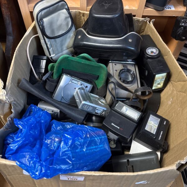 Box full of cameras and accessories, including vintage, Fuji film, Kodak and more