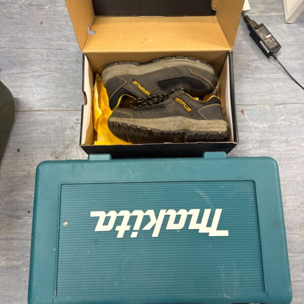 Pair of used caterpillar elmore safety shoes size 8 with empty Makita tool box