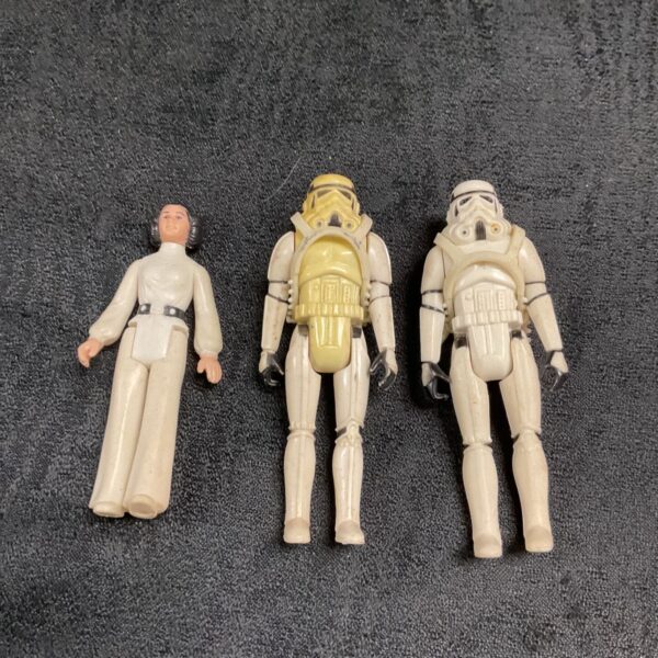 Three Vintage 1977 Star Wars Figures Princess Leia abd Two Storm Trooper