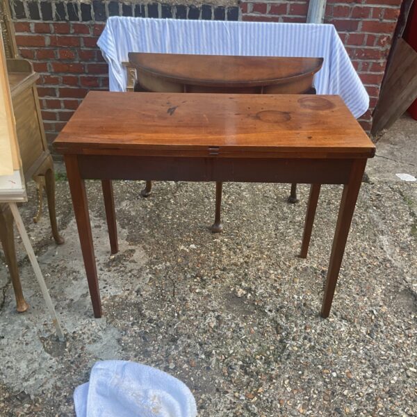Antique fold-over mahogany tea table