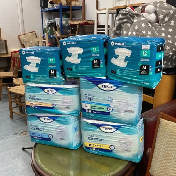 7 sealed packs of assorted size pads inc tena proskin & sunkiss