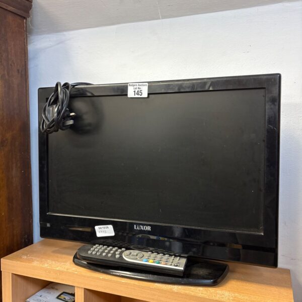 Luxor 19 inch monitor with remote control for computers.