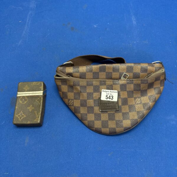 LV style Damier bum bag beside a vintage monogram cigarette case