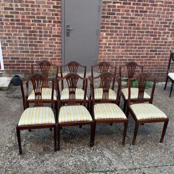 Set of eight antique mahogany dining chairs with wheatsheaf backs.