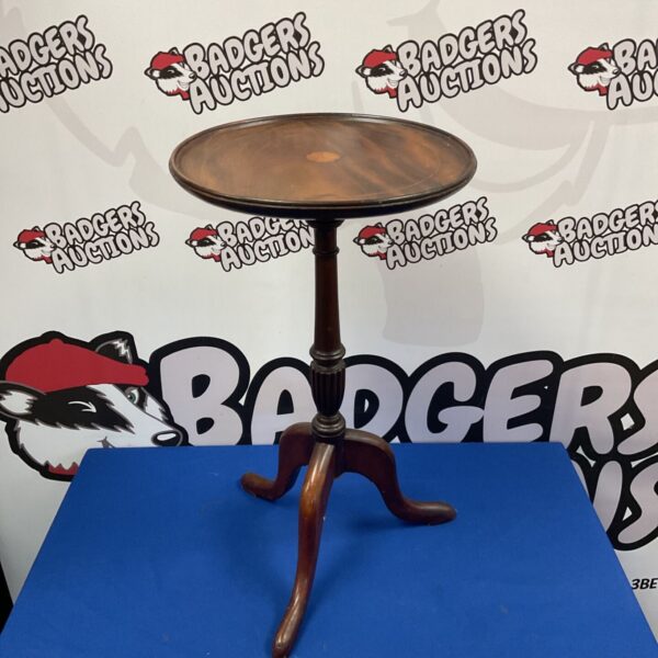 Antique mahogany tripod wine table with shell inlay detail.