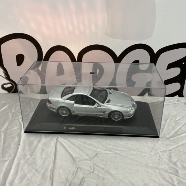 Silver Maisto Mercedes SL 55 AMG model car in clear display case