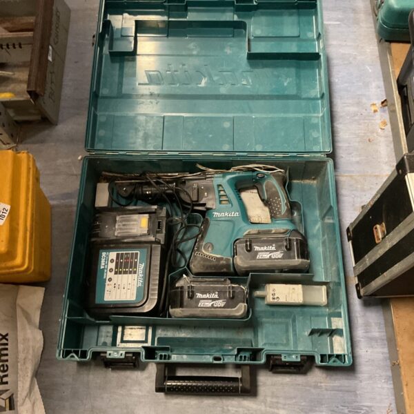 Makita 36v SDS drill kit with batteries and charger in case.