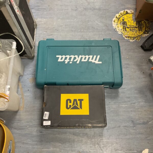 Makita tool case with Caterpillar Elmore Low safety trainers.