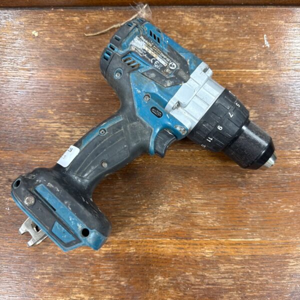 Makita DHP481 cordless drill, side view, power tool.