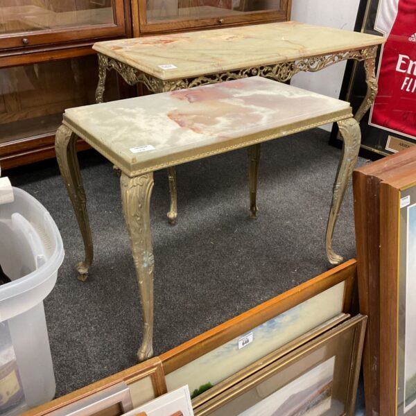 Vintage marble top table with ornate brass base.