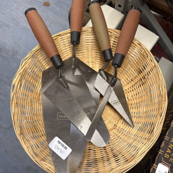 New set of four Marksman trowels for masonry and plastering work.