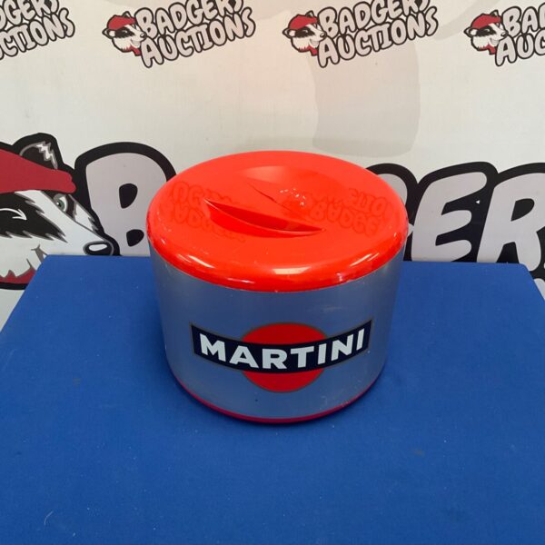 Vintage Martini ice bucket with a damaged lid, classic barware.