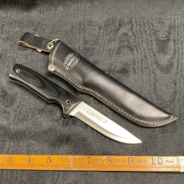 Marttiini Finland sheath knife with leather sheath, sharp blade.