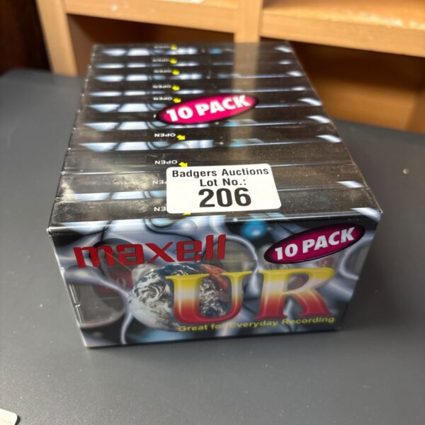Sealed Maxell UR blank cassette tapes 10 pack box on a grey surface