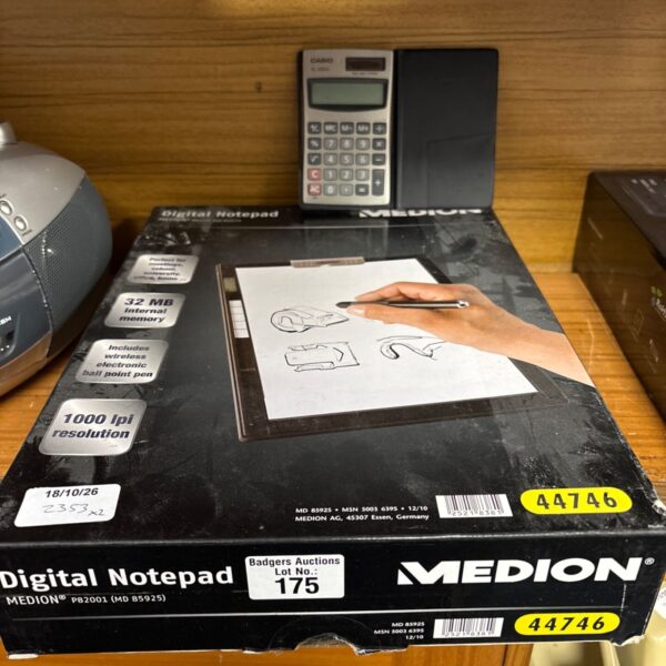 Medion digital notepad with Casio calculator, vintage handheld device.