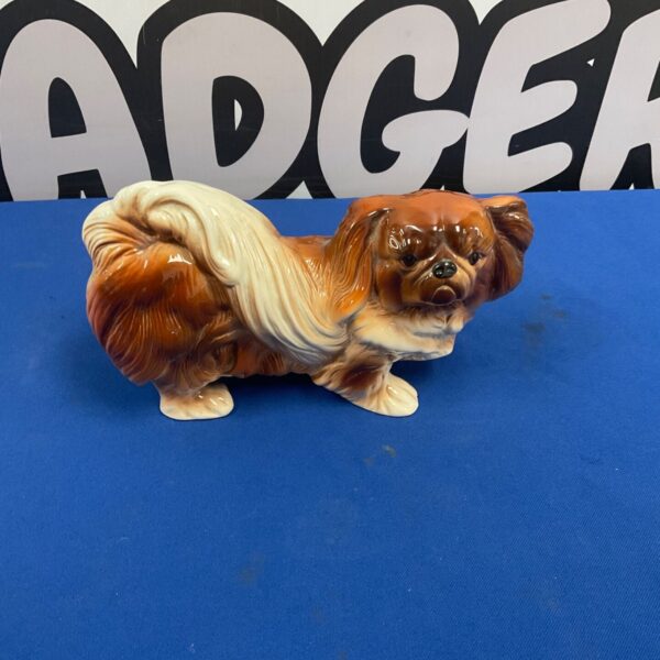 Vintage Melba Ware Pekingese dog figurine with glossy brown and cream glaze