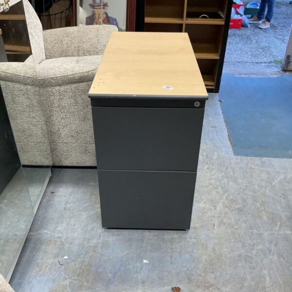 Dark grey metal two-drawer office pedestal filing cabinet with light wood-effect top