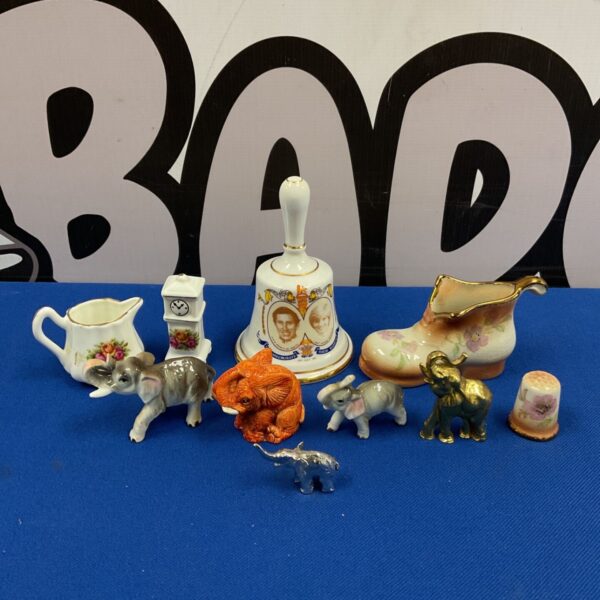 Collection of china and miniature elephant ornaments with royal wedding commemorative bell