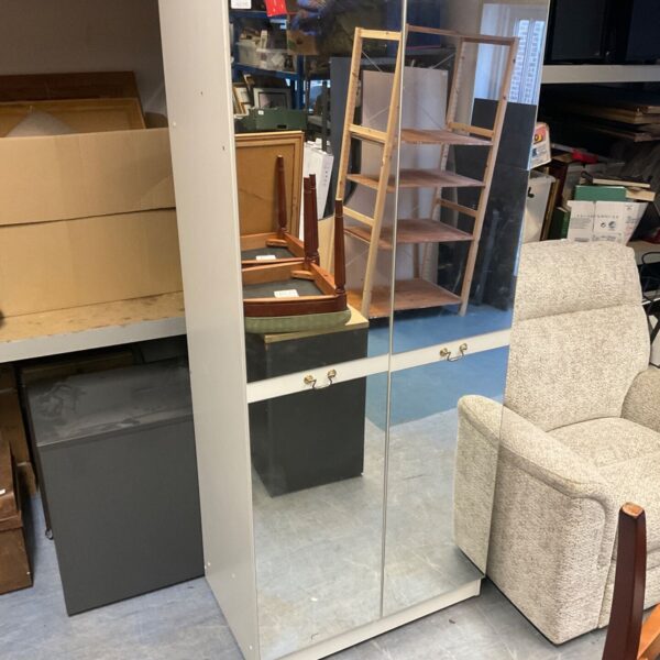 Freestanding mirrored wardrobe with two mirrored doors and grey carcass