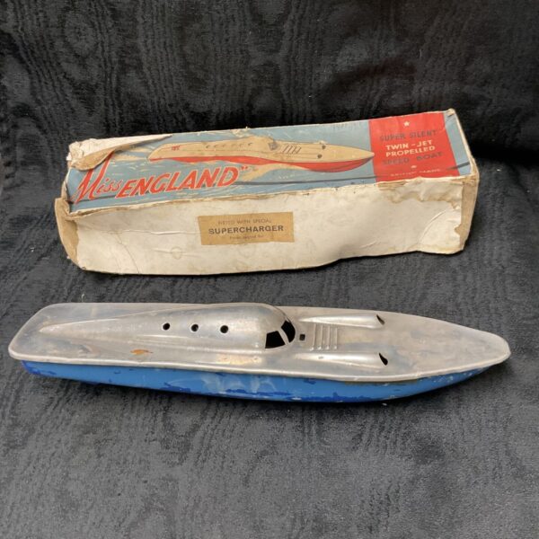 Vintage Miss England speed boat with original box, 1950s toy.
