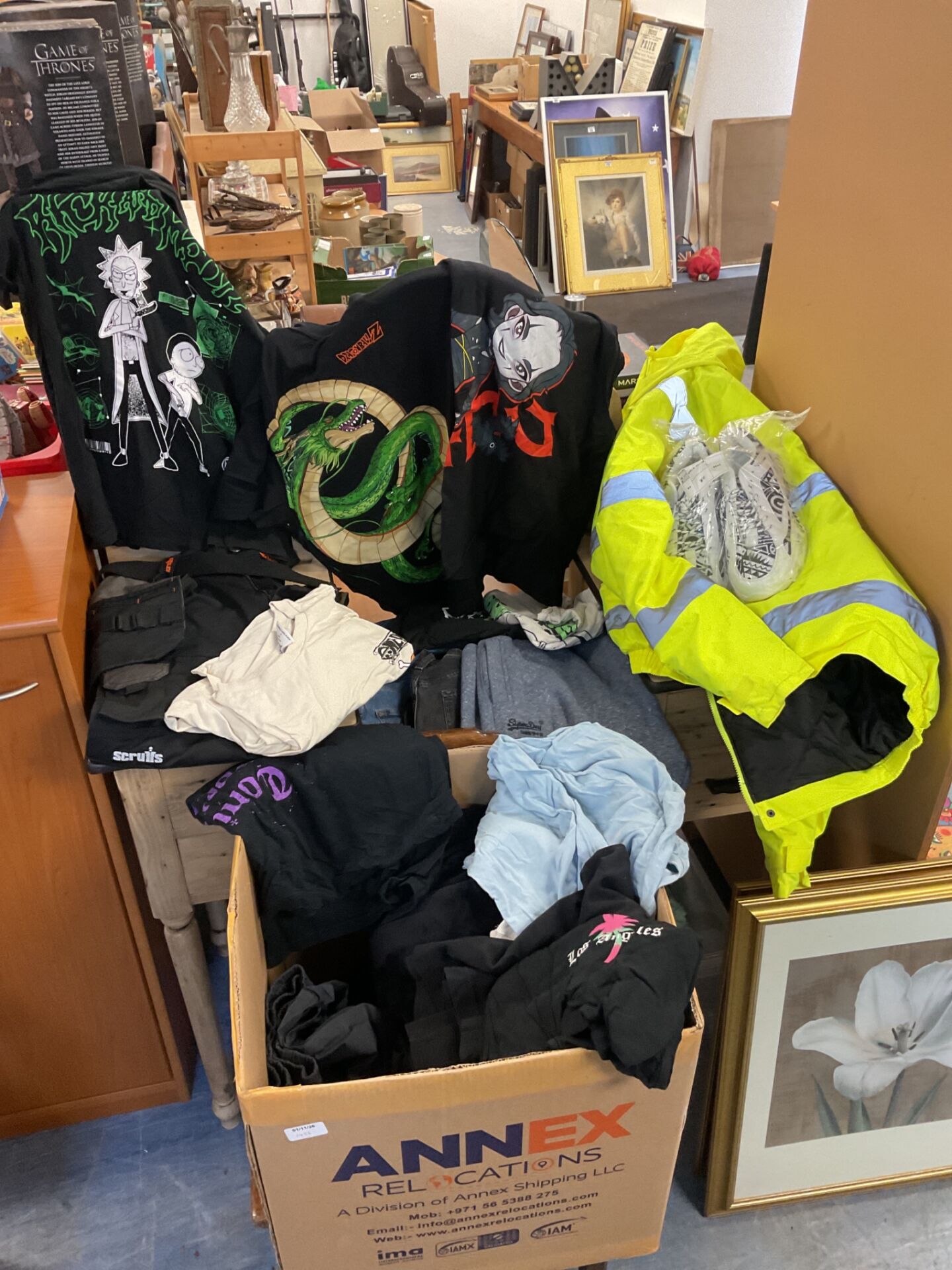638 Box of mixed clothing including superdry, denim co, dragon ball z & one piece tshirts