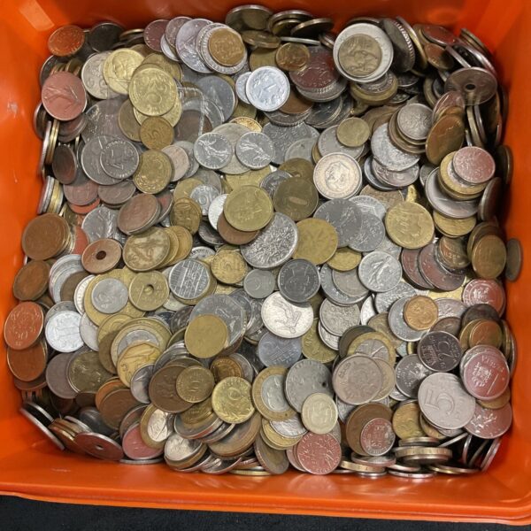 Large lot of mixed coins, diverse world currency collection.