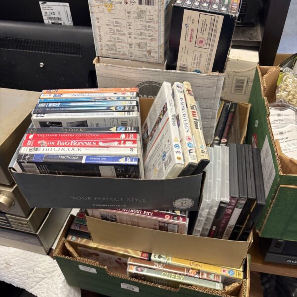 Mixed job lot of DVDs and box sets in cardboard boxes