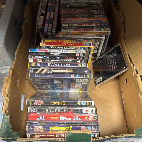 Mixed DVD lot with various film covers for home entertainment.
