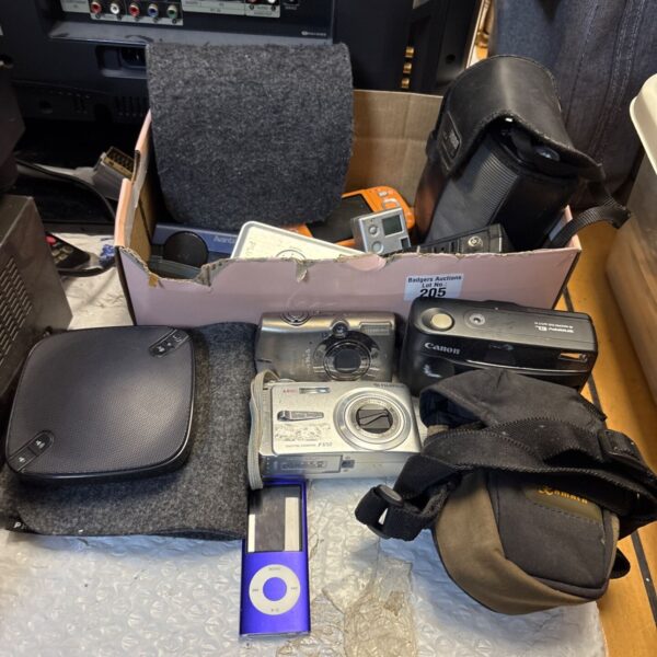 Mixed electronics lot including iPod and digital cameras.