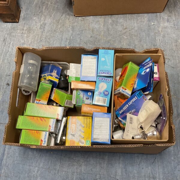 Box of mixed light bulbs with Philips, Status and Kingavon packaging