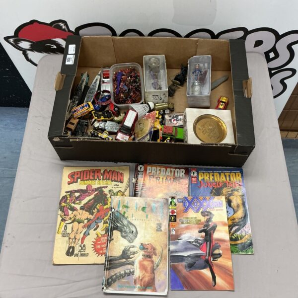 Mixed lot of vintage collectibles including diecast models and Spider-Man comics.