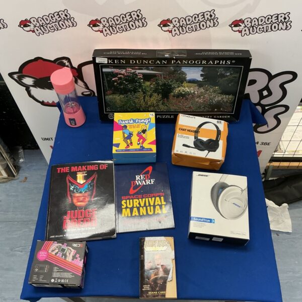 Mixed lot of electronics and games including Bose headphones and puzzle.