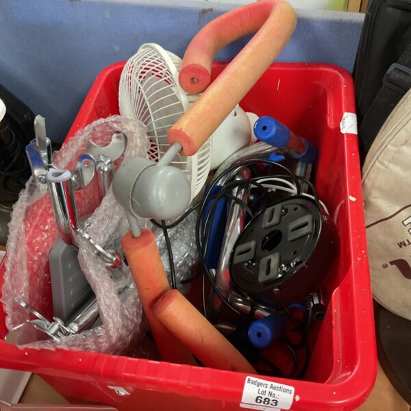 Mixed lot of household items including a fan and exercise handles.