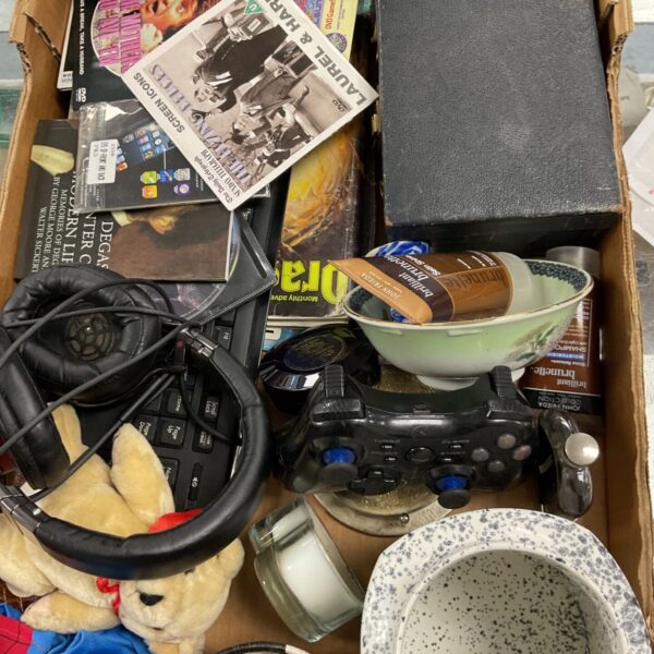 Mixed lot of vintage magazines and Sony headphones on a tray.