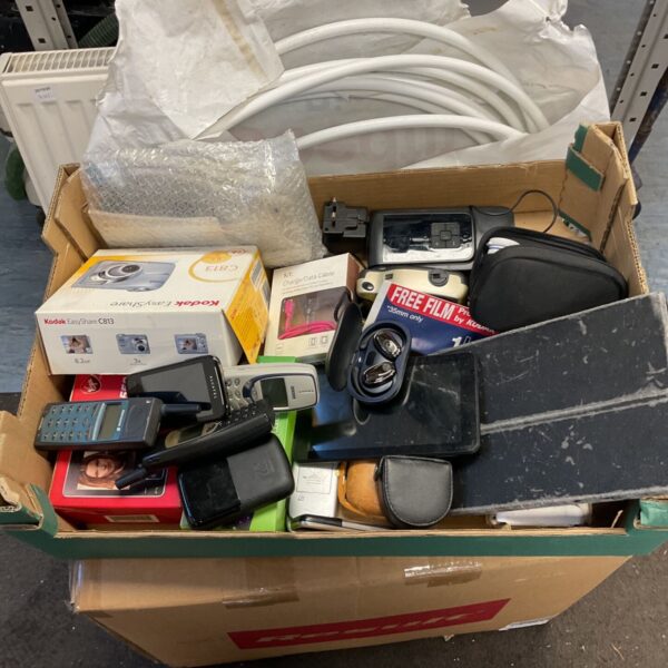 Mixed tray of mobile phones, Kodak camera box and accessories at auction