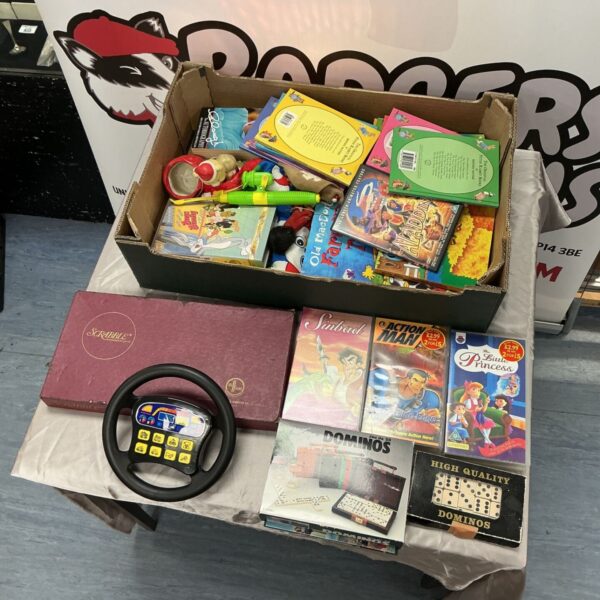 Mixed lot of Scrabble, dominoes, children's books and VHS tapes