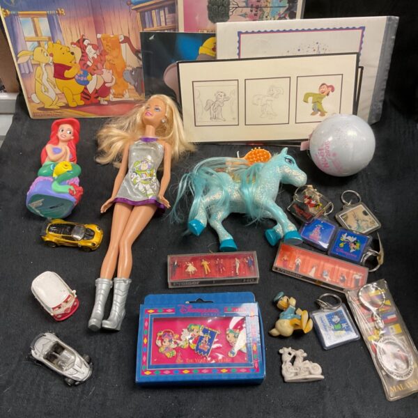 Mixed toy lot featuring Barbie, Toy Story, and Disney figures.