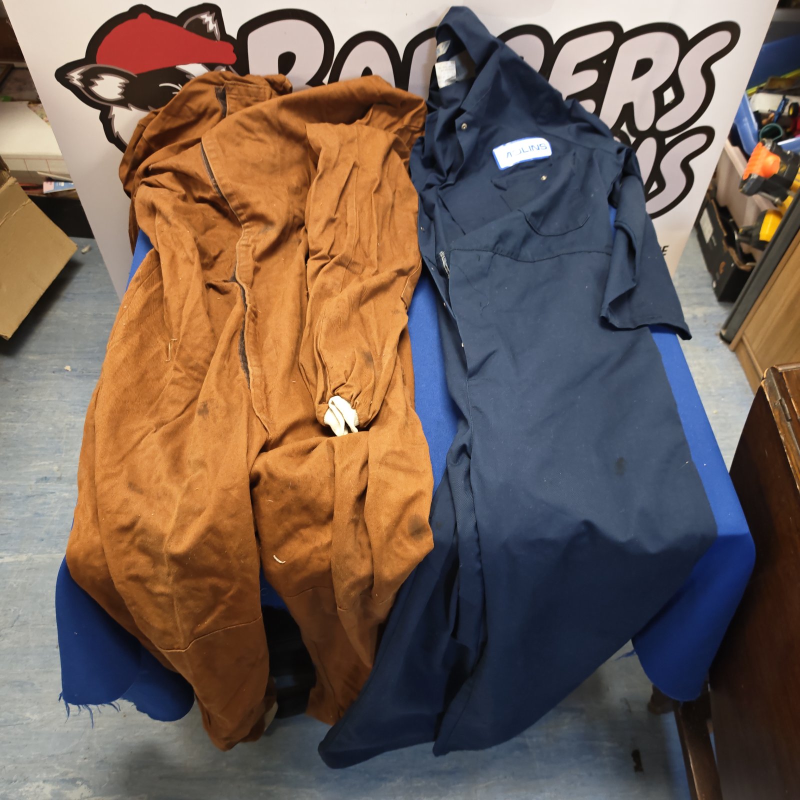 Vintage Molins workshop overalls, showing wear and tear.
