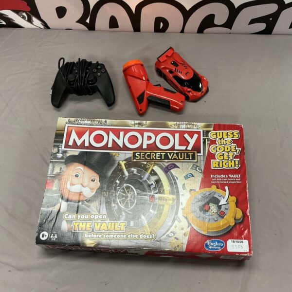 Monopoly Secret Vault game with AirHogs car and controller.