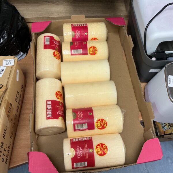 Quantity of Morrisons Altar Candles in original packaging.